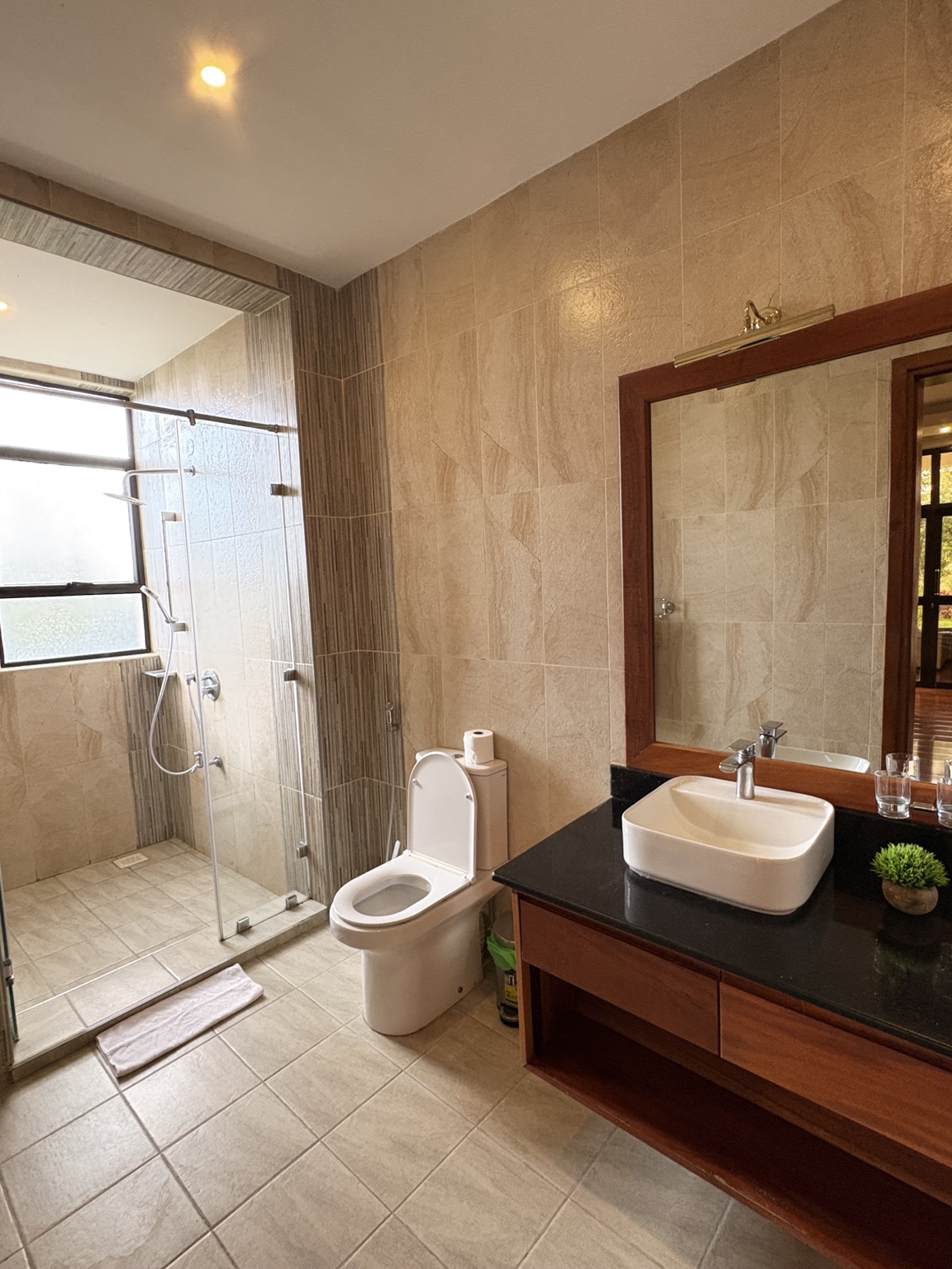 Villa 54 Deluxe Bathroom with vanity and walk-in shower