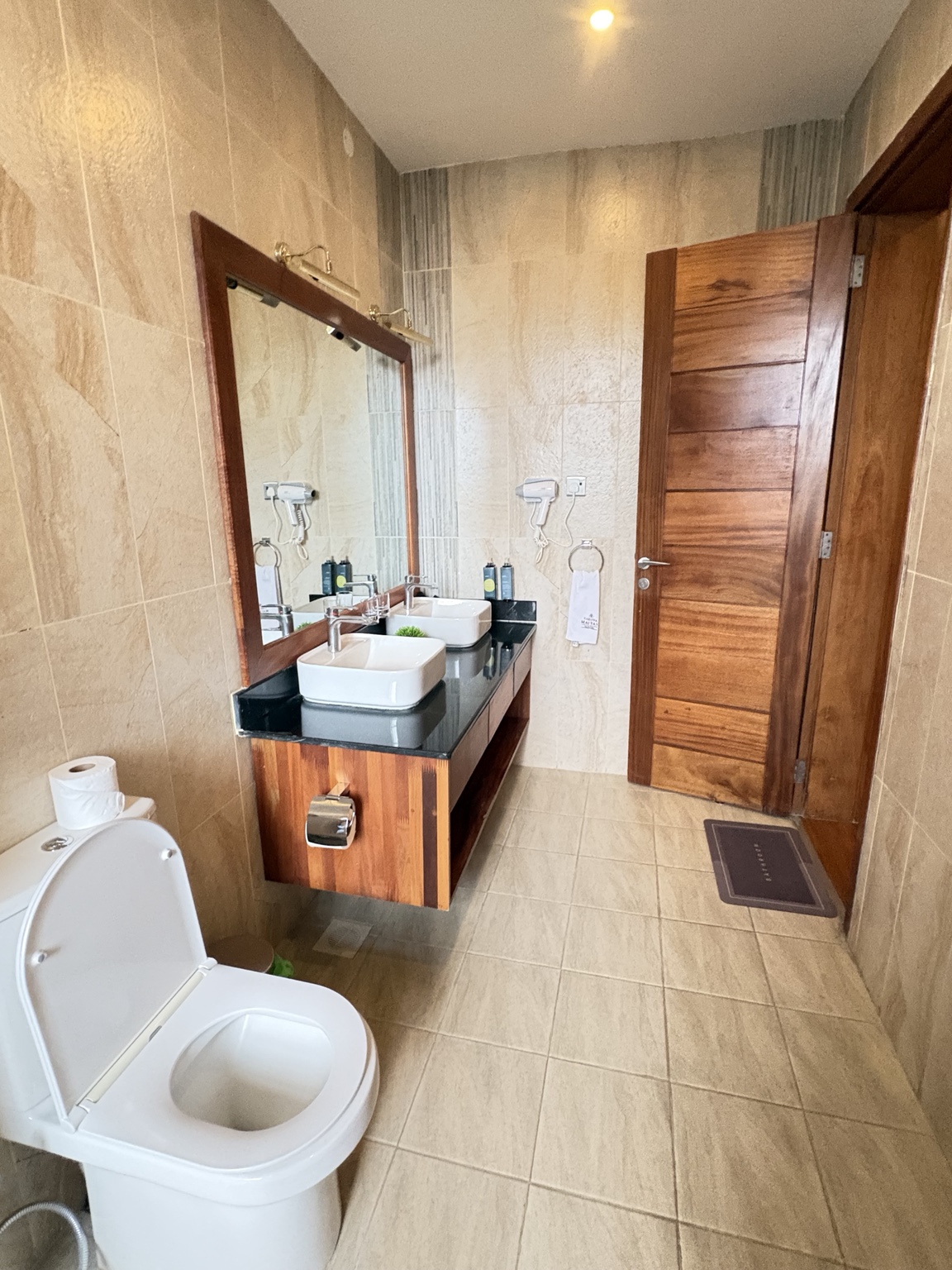 Villa 54 Deluxe Bathroom with double vanity and mirror