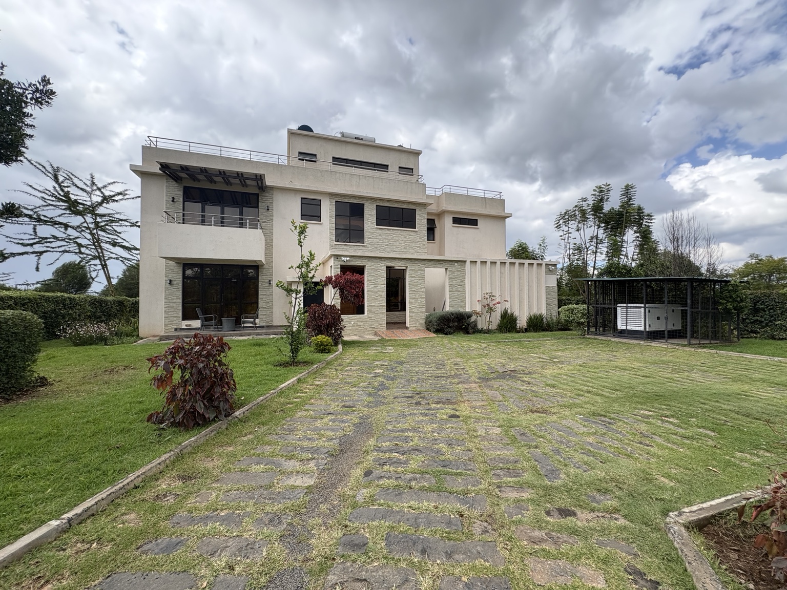 Villa 54 exterior and landscaped grounds